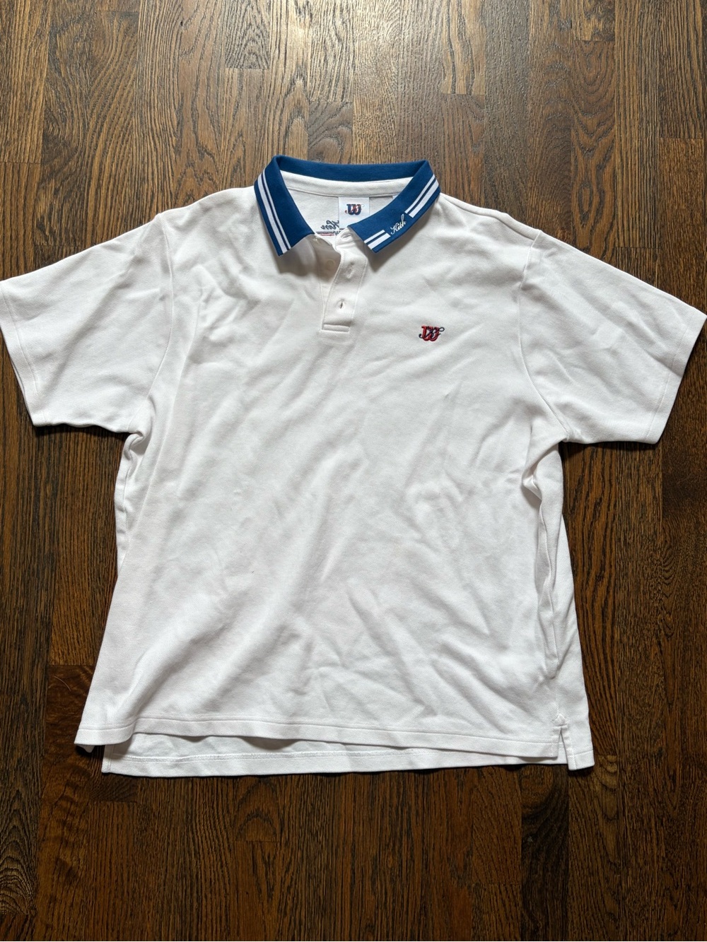 Men’s Kith + Wilson golf polo shirt